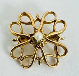 SMALL PRETTY 10K GOLD AND SEED PEARL SCROLL BROOCH