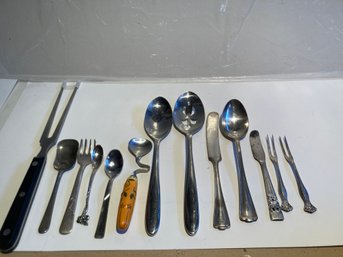 Group Of Kitchen Spoons And A Utensil Two