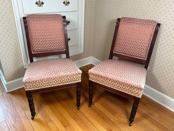 Pair Of Antique Victorian Carved Wood Upholstered Chairs On Casters