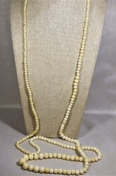 Elongated Strand Of Genuine White Coral Beads Graduated 48' Long