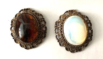Two Oval Pins Brooches In Similar Pierced Metal Frames