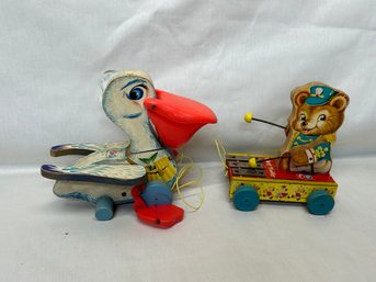 A Pair Of Antique Fisher Price Wooden Pull Toys