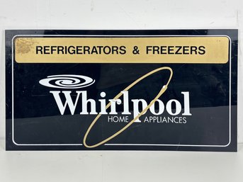 A Vintage Metal Whirlpool Appliance Sign