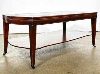 A Vintage Mahogany Coffee Table With Oval Tooled Leather Inset Top, C. 1940's