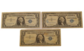 1957, 1957-A, 1957-B One Dollar Silver Certificates With Blue Seal