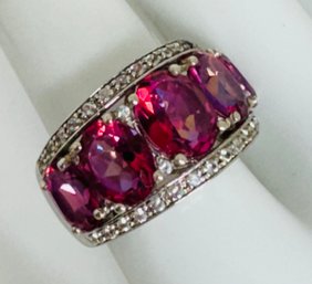 GORGEOUS SIGNED STS STERLING SILVER PINK WITH PURPLE HUES AND WHITE GEMSTONE RING
