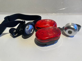 Helmet Headlight, Reflectors And A Bell For A Bike