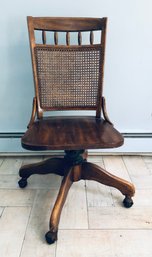 Vintage Mid Century Modern Cane Back Rolling Swivel Bankers Chair