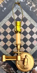 A Vintage Brass Articulating Arm Wall Sconce - AS IS