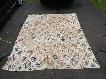 AN ANTIQUE QUILT