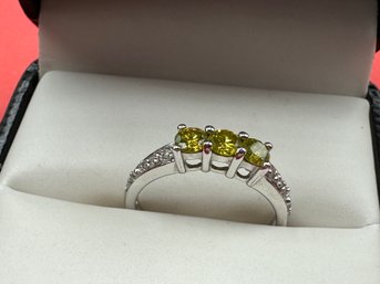 3 African Round  Yellow Diamonds With 4  Round African White Diamonds Set In 18K White Gold