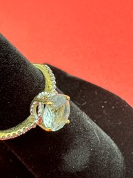 Round Aquamarine From Brazil With 14 Round Diamonds From Africa On 14K Yellow Gold Band