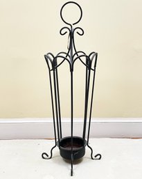 A Charming Wrought Iron Umbrella Stand