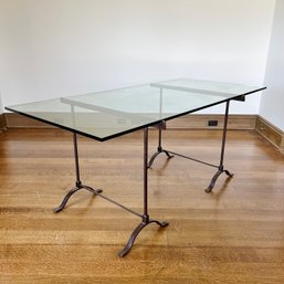 A Glass Table/desk With Hand Forged Wrought Iron Base