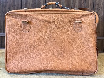 A Vintage Leather Suitcase