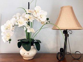 A Faux Orchid And Metal Accent Lamp