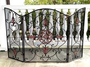 A Large Wrought Iron Fireplace Screen