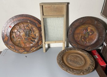 THREE GERMAN CARVED WOOD PLAQUES AND WASHBOARD