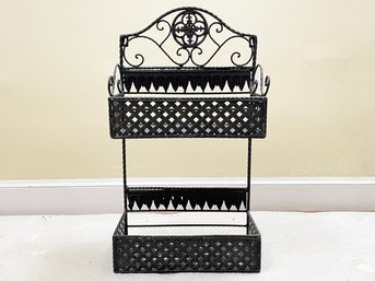 A Pierced Metal Wall Mount Shelf