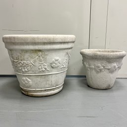 A Duo Of Cement Cast Garden Pots