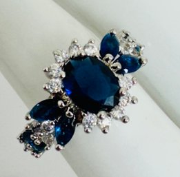 PRETTY STERLING SILVER BLUE AND WHITE CZ RING