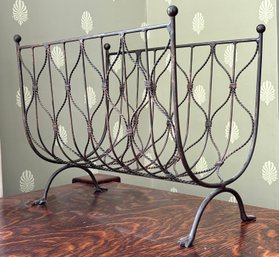 A Vintage Wrought Iron Magazine Rack