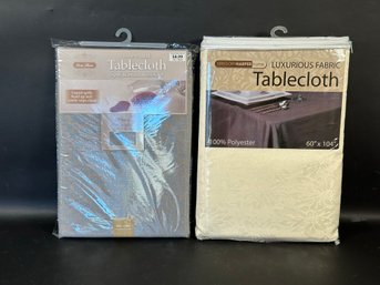 A Pair Of New-in-Package Table Cloths