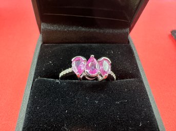 18 K  Whit Gold Setting With Pink Sapphires And Round Diamonds