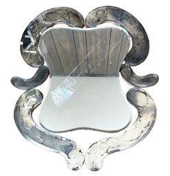 A Vintage 1950's Curvaceous Beveled Mirror