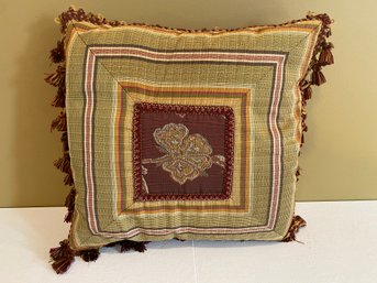 A Classic Decorative Pillow With Fringed Tassels