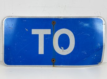 A Road Sign - To