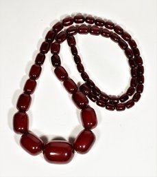 Elongated Cherry Amber Beaded Necklace 68.6 Grams