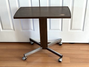 A Great Vintage Table With A Laminate Top & Wheeled Base