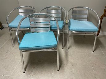 Set Of 4 Stackable Metal Chairs.