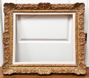 An Ornate Gilt Wood Frame