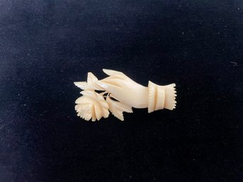 Carved Bone Brooch With Hand And Flower