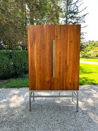 A CB2 Muse Armoir Or Bar Cabinet  - Teak On Metal Base - Mirrored Interior