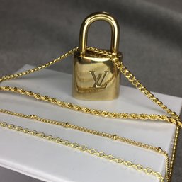 Fabulous Genuine LOUIS VUITTON Lock Mounted As Necklace Pendant - Comes With Four Different Chains - WOW !