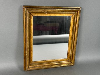 An Antique Gold Painted Mirror
