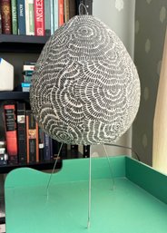 An Accent Lamp, Egg Form, Printed On Paper Stretched Over Metal Frame And Stand