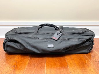 A Tumi Rolling Suitcase