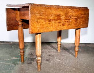 A 19th Century Pine Drop Leaf Table