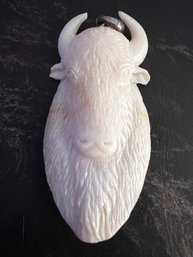 Carved Ivory Shell Horned Bovine Pendant