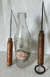 Coca Cola Grouping- 75th Anniversary Bottle And A Pair Of Advertising Ice Picks