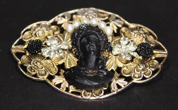 Gilt Metal Filigree Floral Brooch Having Black Cameo Of Neoclassical Woman