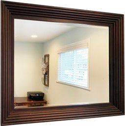 A Modern Fluted Walnut Beveled Mirror