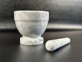 A Mortar & Pestle In Natural Marble