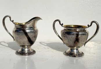 A Set Of Vintage International Sterling Silver 'Old Rose' Sugar And Creamer