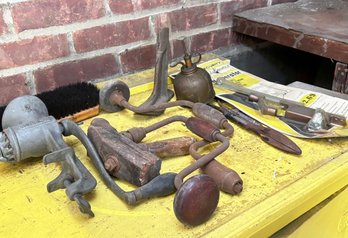 An Antique Meat Grinder And Assorted Hand Tools