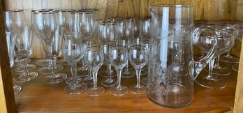 Large Lot Of Stemware And Pitcher